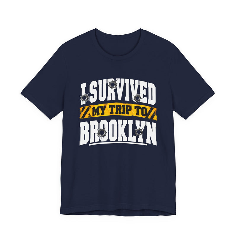 T-Shirt with collegiate lettering reading I SURVIVED MY TRIP TO BROOKLYN, front view.