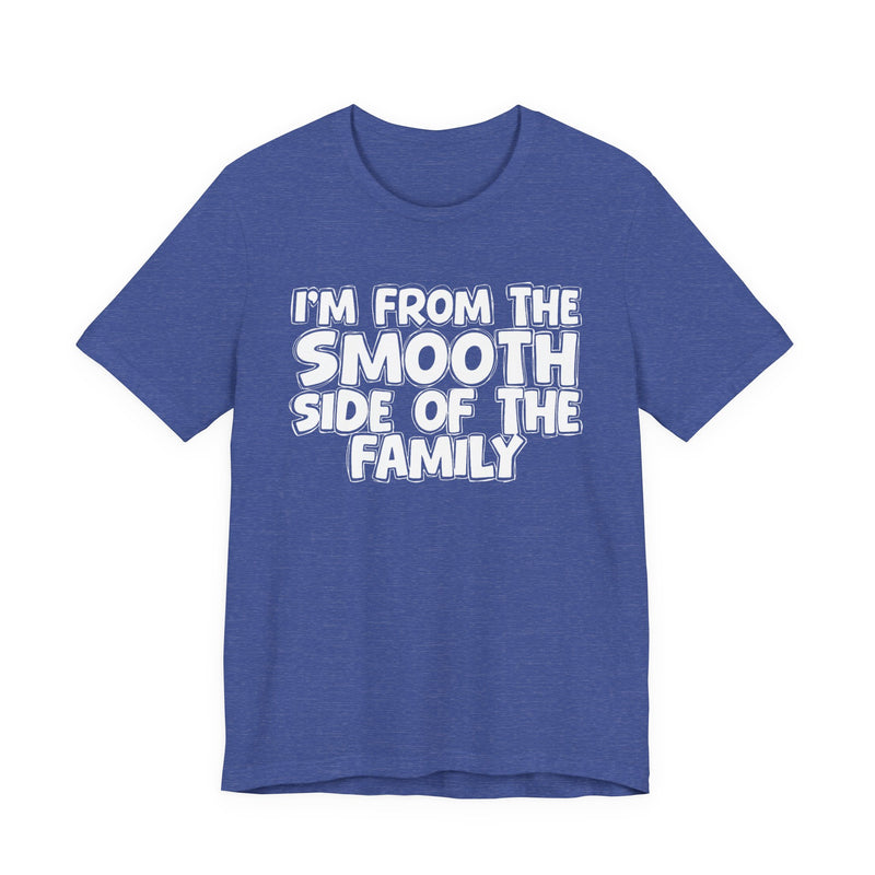 Heather True Royal t-shirt, printed with the "I'M FROM THE SMOOTH SIDE OF THE FAMILY" statement in bold outlined bubble lettering, front flat-lay view.
