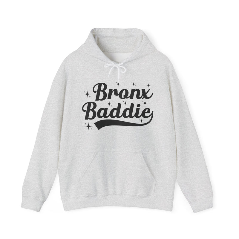 Natural hoodie with black bold statement lettering reading BRONX BEAUTY, front flat-lay view.