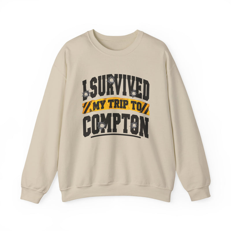 Sweatshirt with collegiate lettering reading I SURVIVED MY TRIP TO COMPTON, front view.