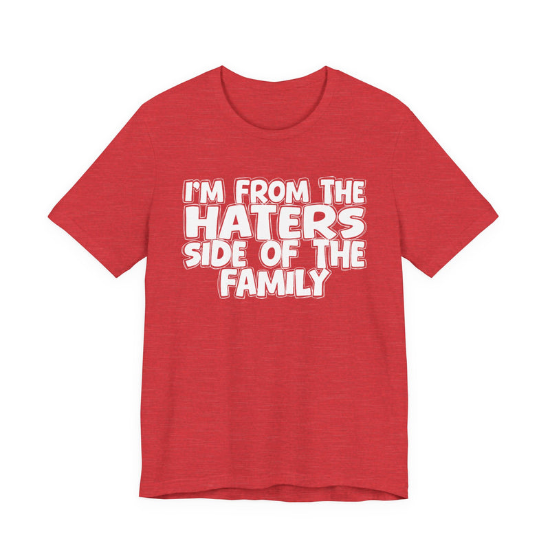 White t-shirt with bold chest statement text reading 'I'M FROM THE HATERS SIDE OF THE FAMILY,' front flat-lay view.