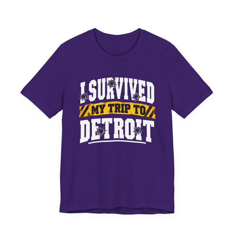 T-shirt with bold lettering reading I SURVIVED MY TRIP TO DETROIT, product view.