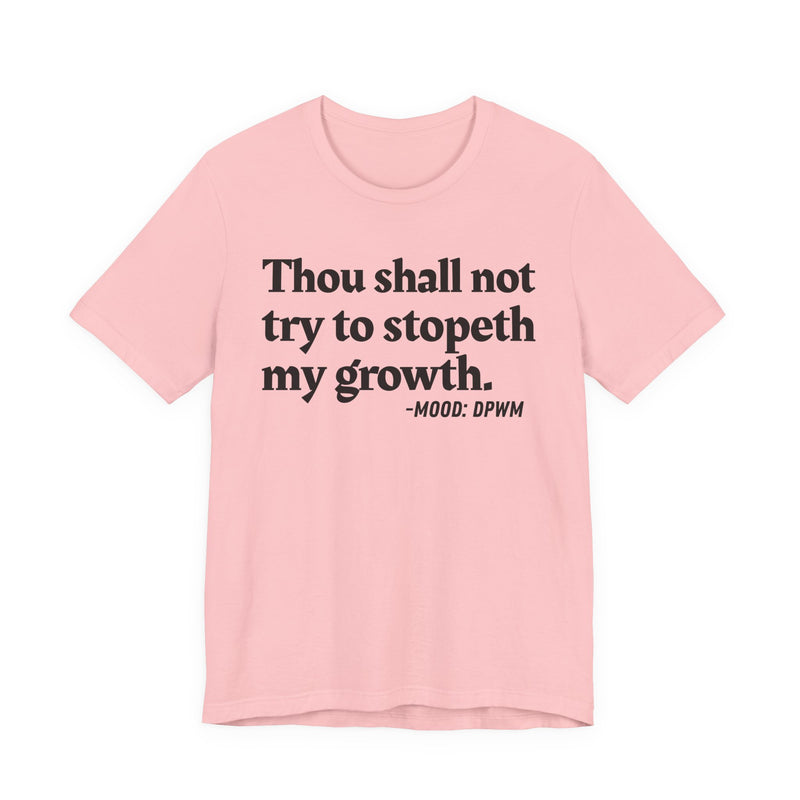 T-Shirt with “THOU SHALL NOT TRY TO STOPETH MY GROWTH” statement print