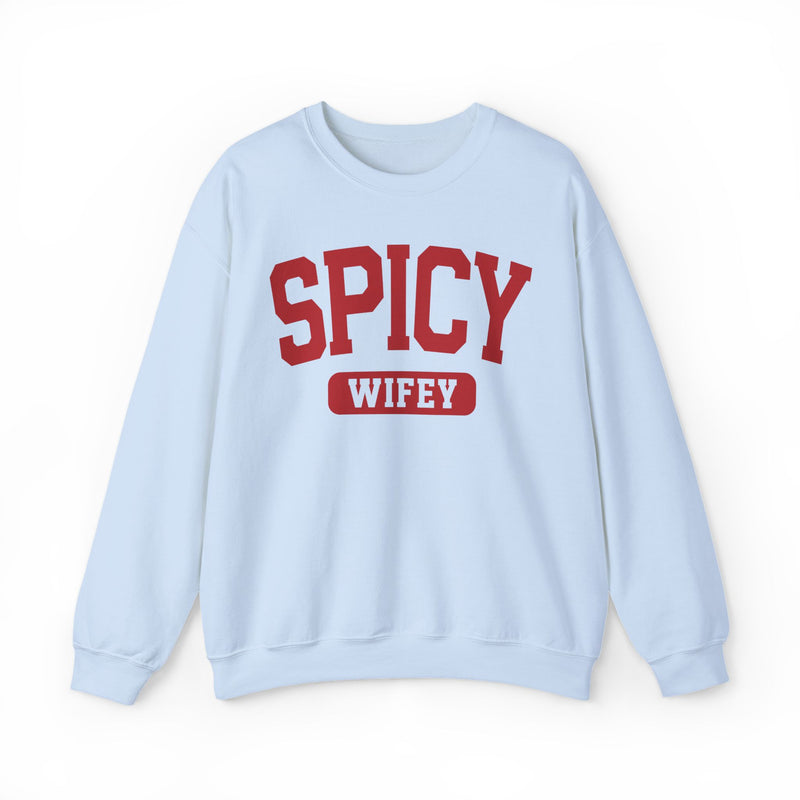 Light blue sweatshirt with contrasting statement lettering reading SPICY WIFEY, front flat-lay view.