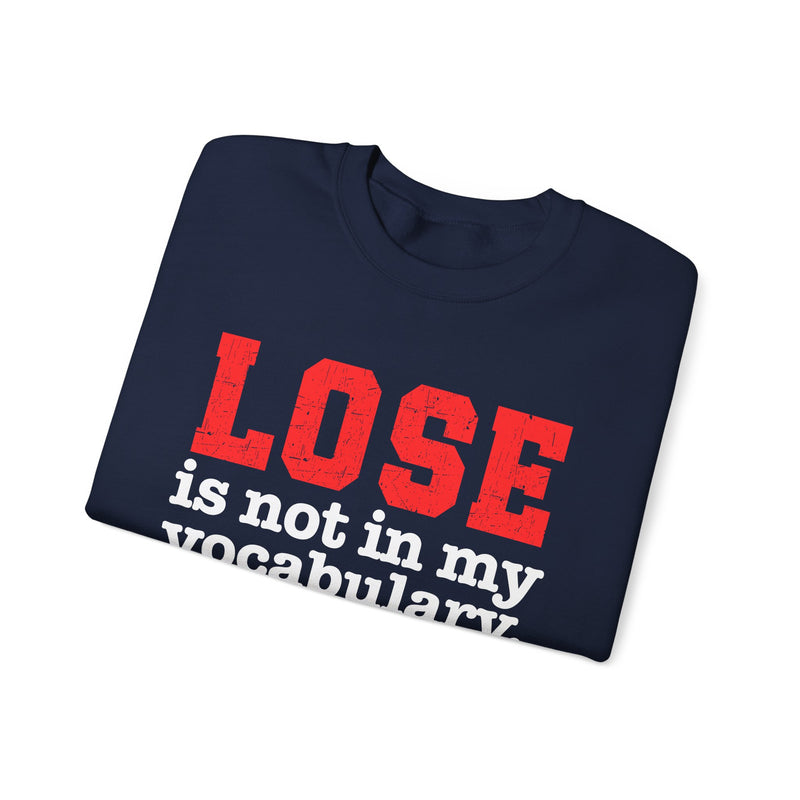 Charcoal sweatshirt with white lettering reading "LOSE IS NOT IN MY VOCABULARY", front flat-lay view.