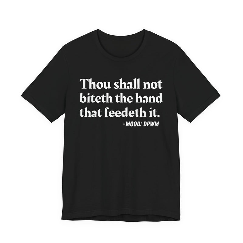 T-Shirt with text design reading “THOU SHALL NOT BITETH THE HAND THAT FEEDETH IT”, front view