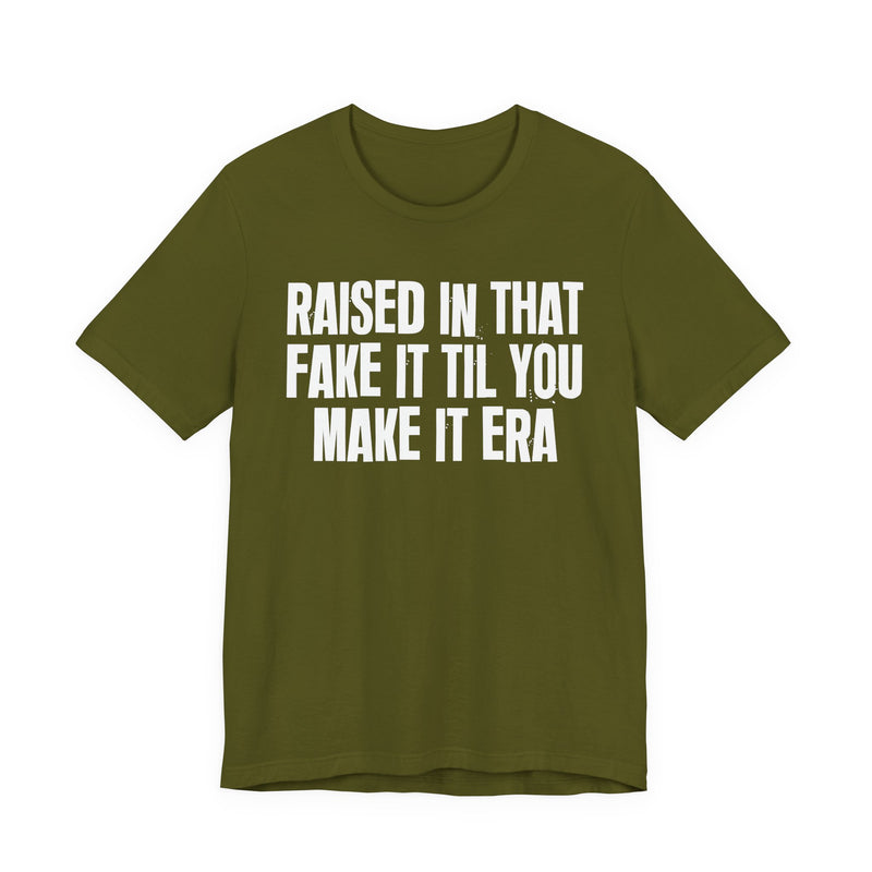 T-Shirt product with lettering reading "RAISED IN THAT FAKE IT TIL YOU MAKE IT ERA", alternate view.