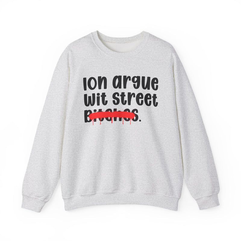 Heathered white sweatshirt with black printed statement graphic, front view: "Ion argue" and "Wit street" in rounded chunky lettering over distressed "Bitches." crossed by a red spray-paint strike with paint drips