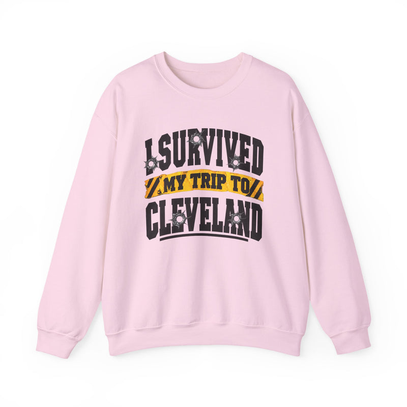 Sweatshirt product with collegiate lettering reading I SURVIVED MY TRIP TO CLEVELAND, flat lay.