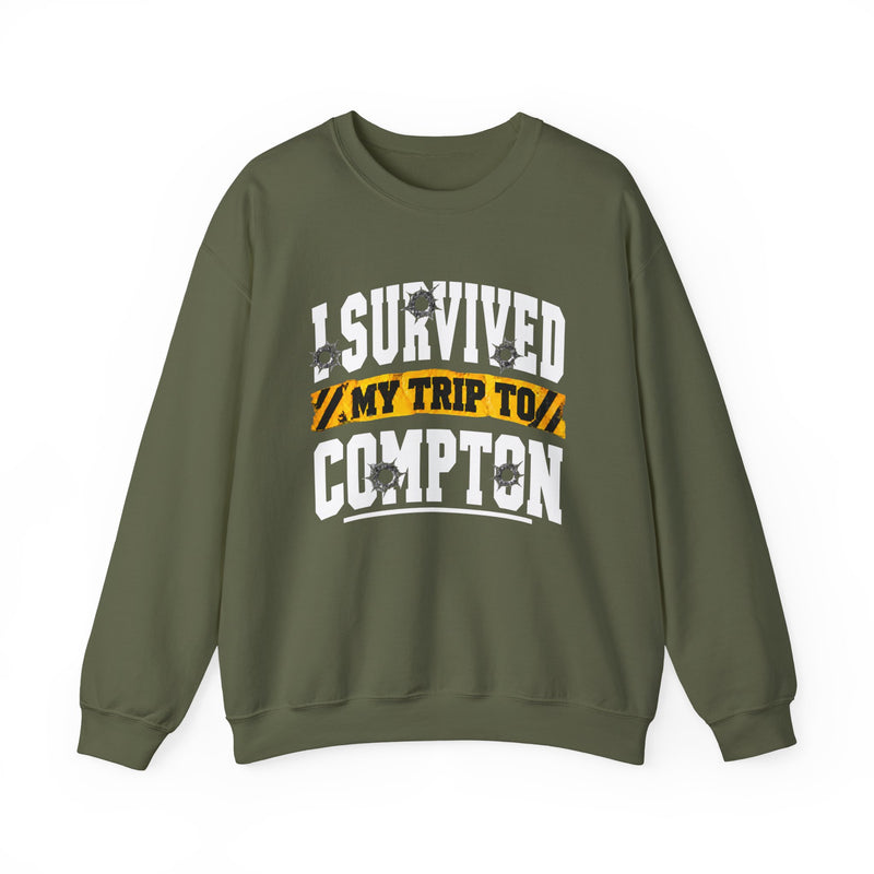 Sweatshirt with collegiate lettering reading I SURVIVED MY TRIP TO COMPTON, front view.