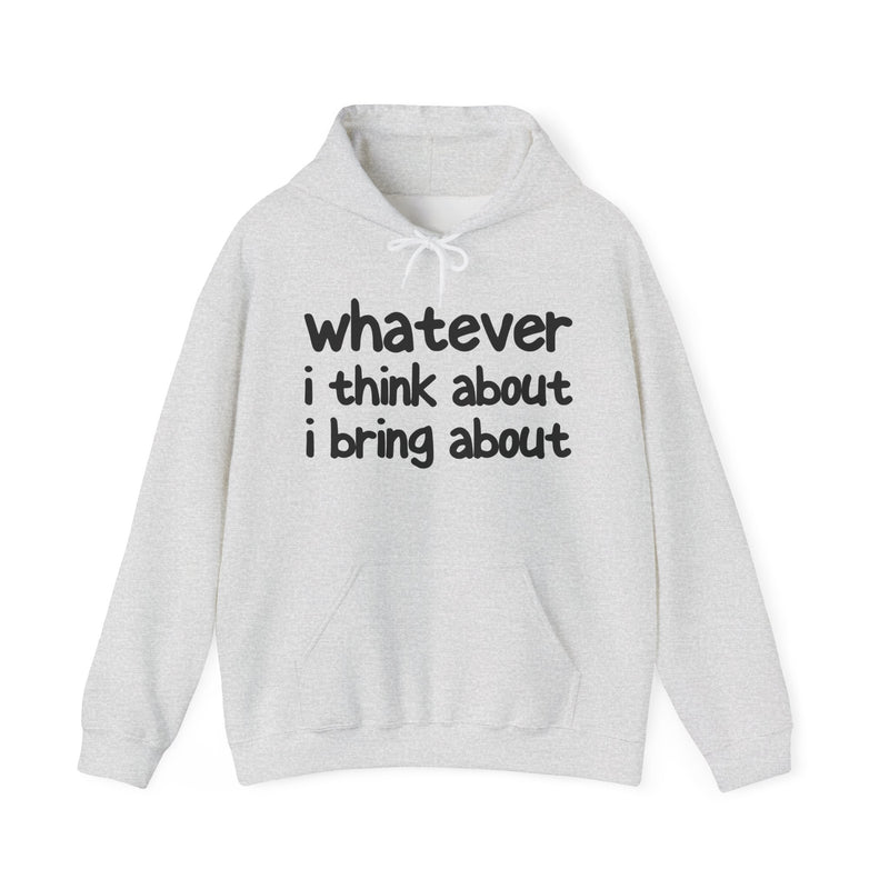 Natural hoodie with contrasting bold statement lettering reading WHATEVER I THINK ABOUT I BRING ABOUT, front flat-lay view.