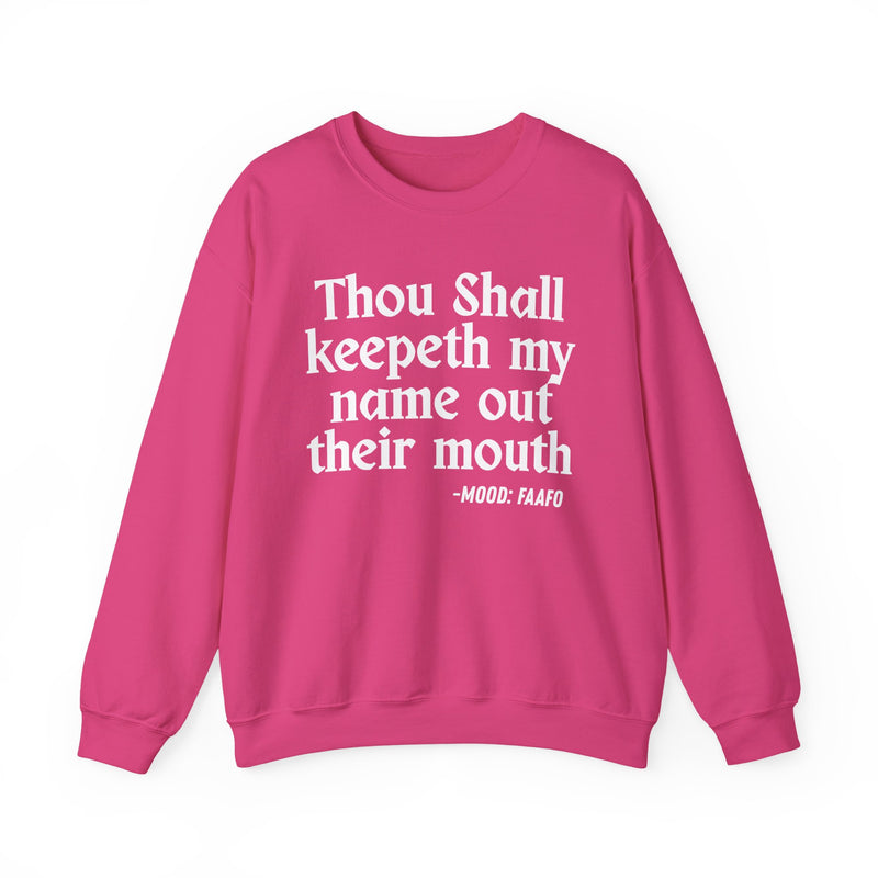 Sweatshirt with text design reading “THOU SHALL KEEPETH MY NAME OUT THEIR MOUTH”, front view