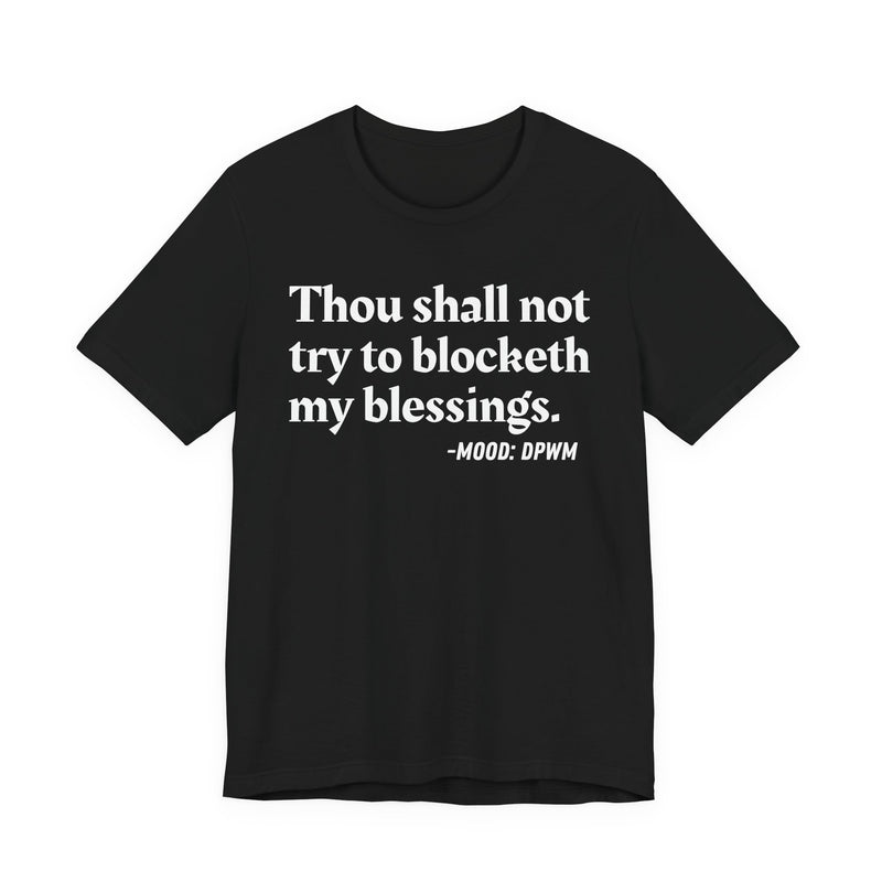 T-Shirt with “THOU SHALL NOT TRY TO BLOCKETH MY BLESSINGS” statement print