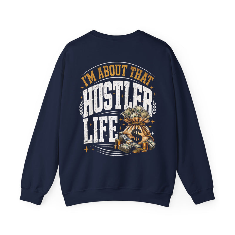 Navy sweatshirt with white and orange distressed trade lettering reading I'M ABOUT THAT HUSTLER LIFE, back view.