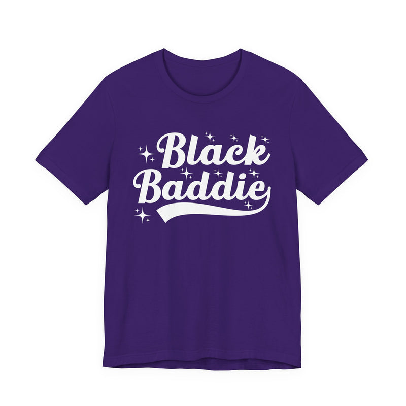 White t-shirt with dark bold statement lettering reading BLACK BADDIE, front flat-lay view.