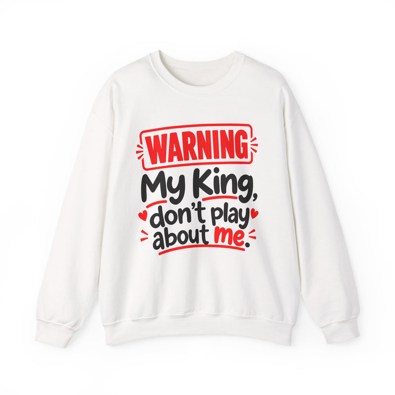 Warning — My King Don’t Play About Me — Sweatshirt fabric detail close-up: lettering reading 'WARNING MY KING DON'T PLAY ABOUT ME'. Street Talk Designs family statement apparel.