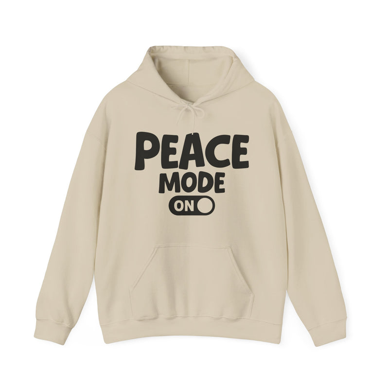 Hoodie in Sand with lettering reading "Peace Mode On", front view.