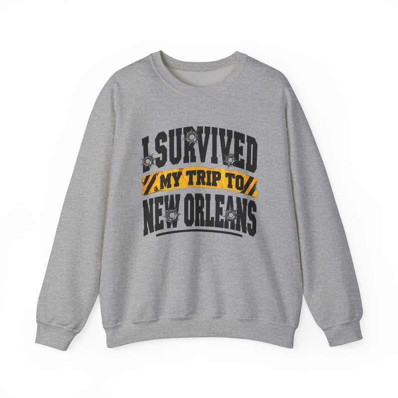 Sweatshirt product with collegiate lettering reading I SURVIVED MY TRIP TO NEW ORLEANS, detail close-up.