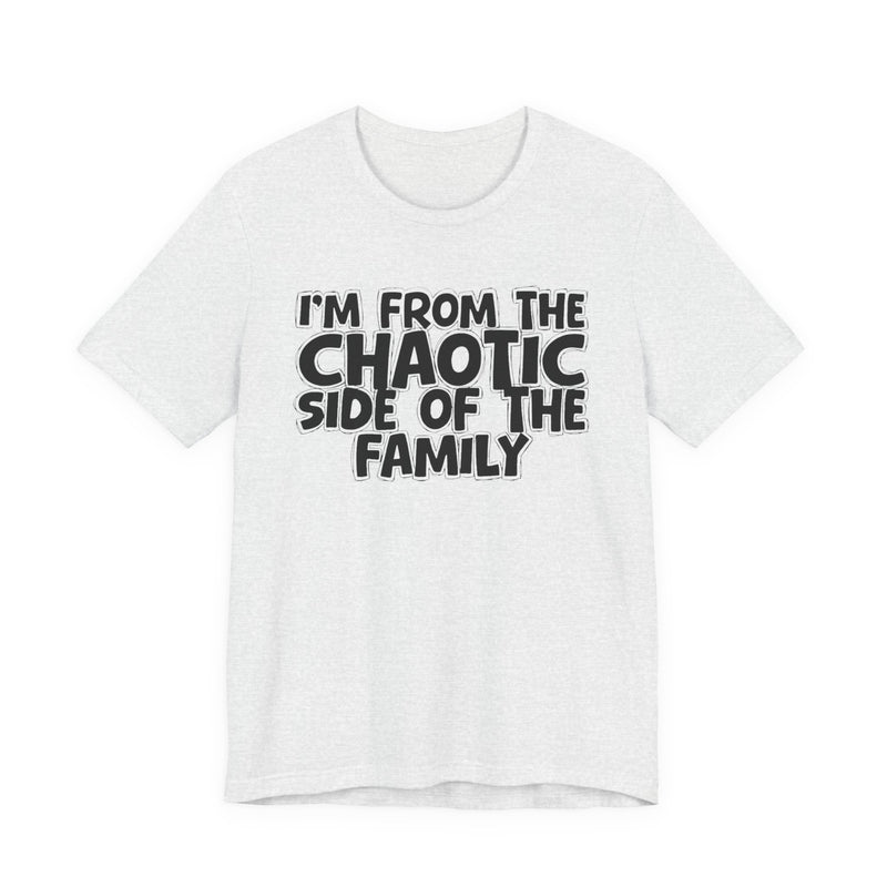 light t-shirt with ‘I’M FROM THE CHAOTIC SIDE OF THE FAMILY’ statement text in bold outline lettering, front flat-lay view.