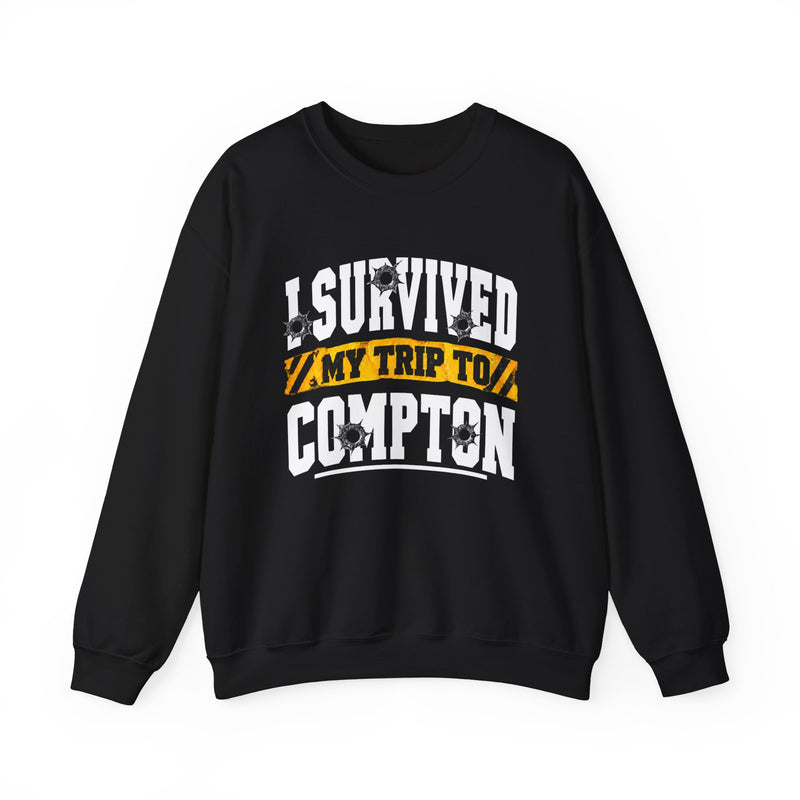 Sweatshirt with collegiate lettering reading I SURVIVED MY TRIP TO COMPTON, front view.