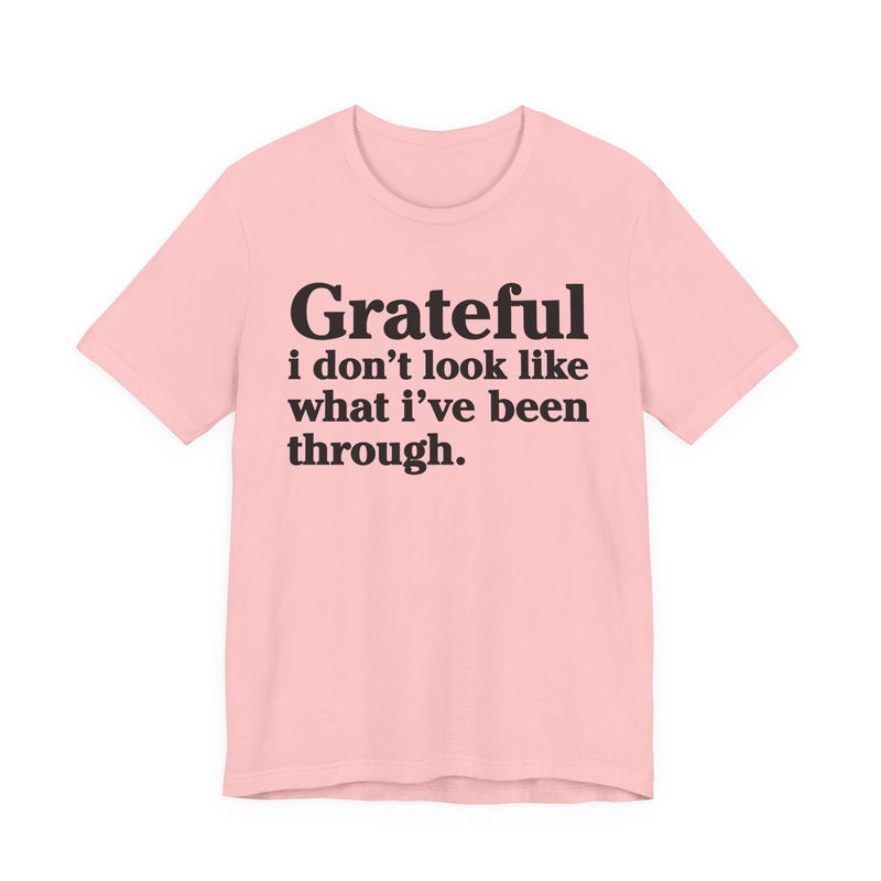 Grateful I Don't Look Like What I've Been Through — Positive Christian T-Shirt