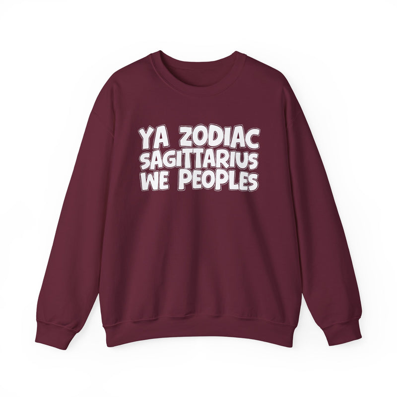 Maroon sweatshirt with white hand-lettered YA ZODIAC SAGITTARIUS WE PEOPLES print, front flat-lay view.