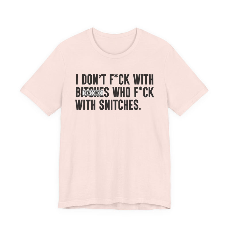 I Don't Fuck With Bitches Who Fuck With Snitches — T-Shirt fabric detail close-up: I DON'T FUCK WITH BITCHES WHO FUCK WITH SNITCHES in bold statement lettering. Street Talk Designs men's statement apparel.