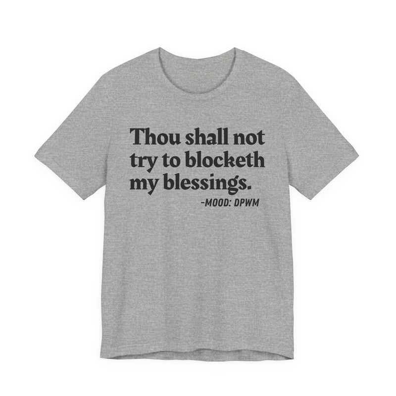 T-Shirt with “THOU SHALL NOT TRY TO BLOCKETH MY BLESSINGS” statement print