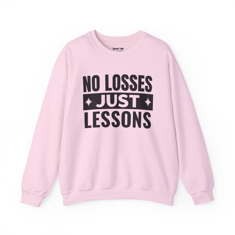 White sweatshirt with black block lettering reading NO LOSSES JUST LESSONS, alternate view.