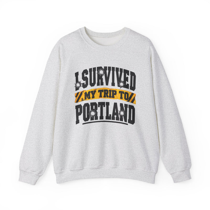 Sweatshirt with collegiate lettering reading I SURVIVED MY TRIP TO PORTLAND, front view.