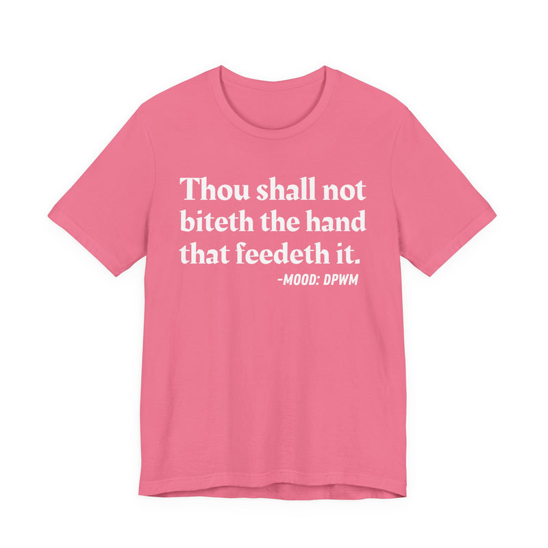 T-Shirt with text design reading “THOU SHALL NOT BITETH THE HAND THAT FEEDETH IT”, front view