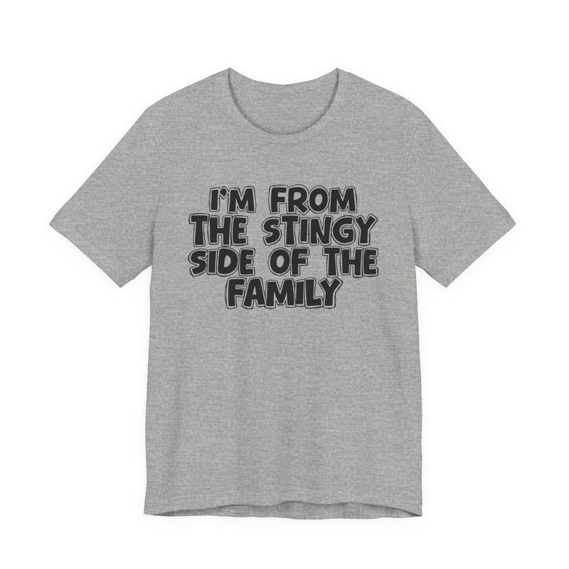 Athletic Heather t-shirt, printed with the "I'M FROM THE STINGY SIDE OF THE FAMILY" statement in bold outlined bubble lettering, front flat-lay view.