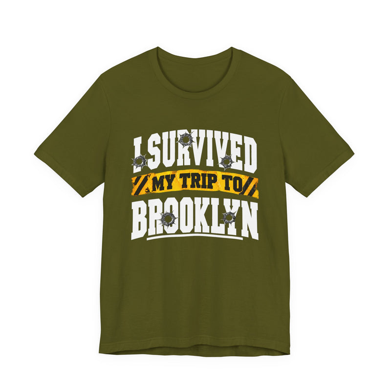 T-Shirt with collegiate lettering reading I SURVIVED MY TRIP TO BROOKLYN, front view.