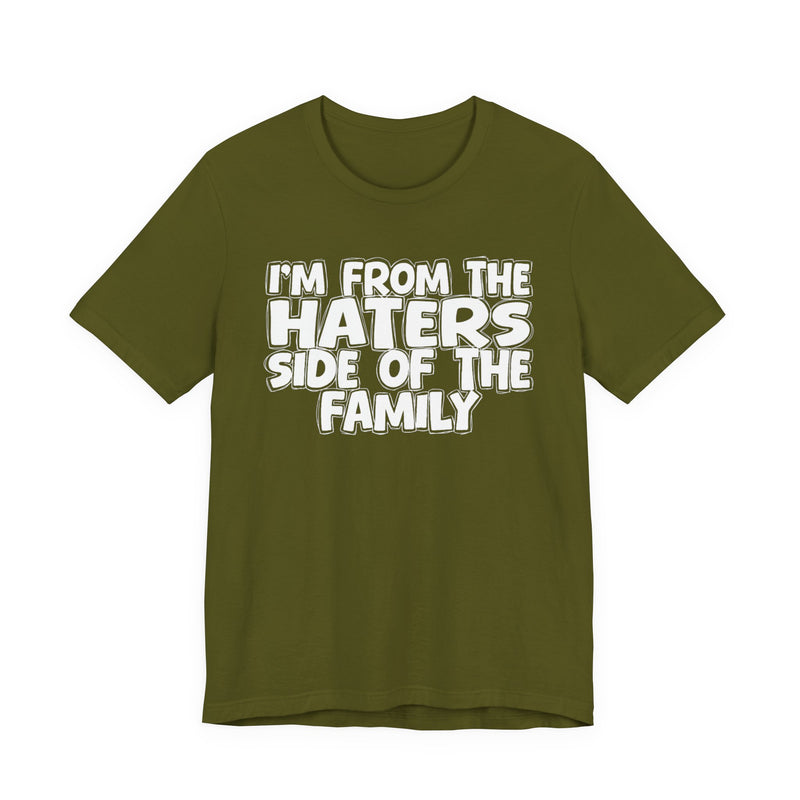 Natural t-shirt with bold chest statement text reading 'I'M FROM THE HATERS SIDE OF THE FAMILY,' front flat-lay view.