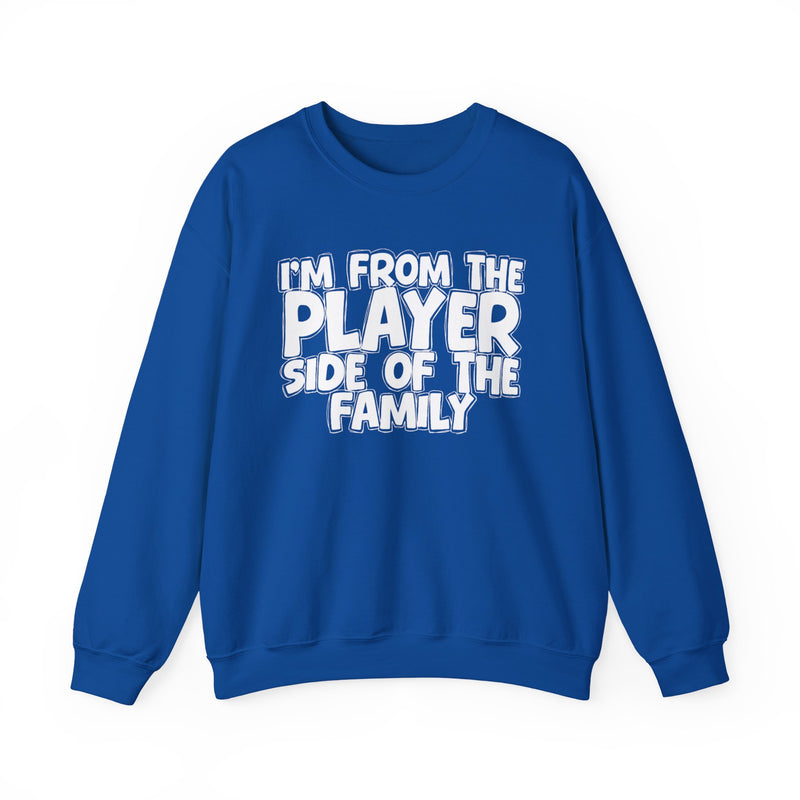 Royal sweatshirt with "I'M FROM THE PLAYER SIDE OF THE FAMILY" in bold white outlined bubble lettering, front flat-lay view