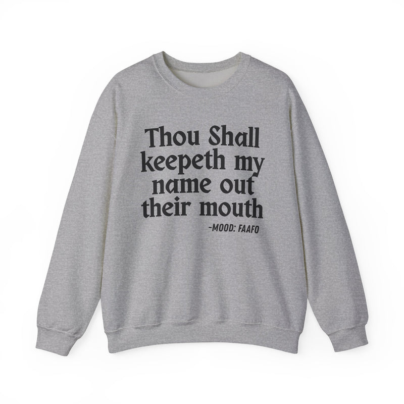 Sweatshirt with text design reading “THOU SHALL KEEPETH MY NAME OUT THEIR MOUTH”, front view