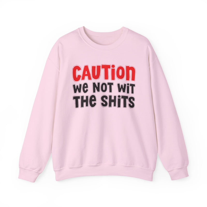 Sweatshirt in Light Pink with lettering reading "Caution We Not With The Shits", front view.