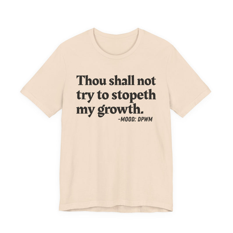 T-Shirt with “THOU SHALL NOT TRY TO STOPETH MY GROWTH” statement print