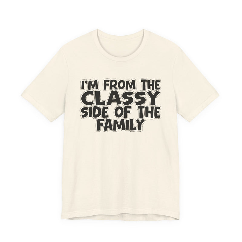 Soft Cream t-shirt with 'I'M FROM THE CLASSY SIDE OF THE FAMILY' in black hand-drawn bubble lettering on the chest, front flat-lay mockup view.