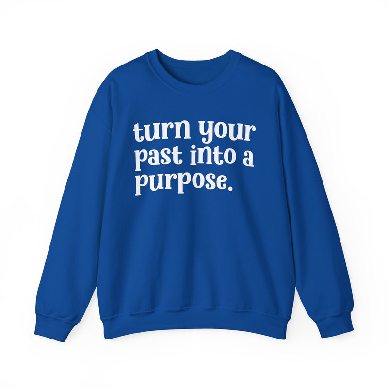 Royal sweatshirt with white "turn your past into a purpose." lettering, front view.