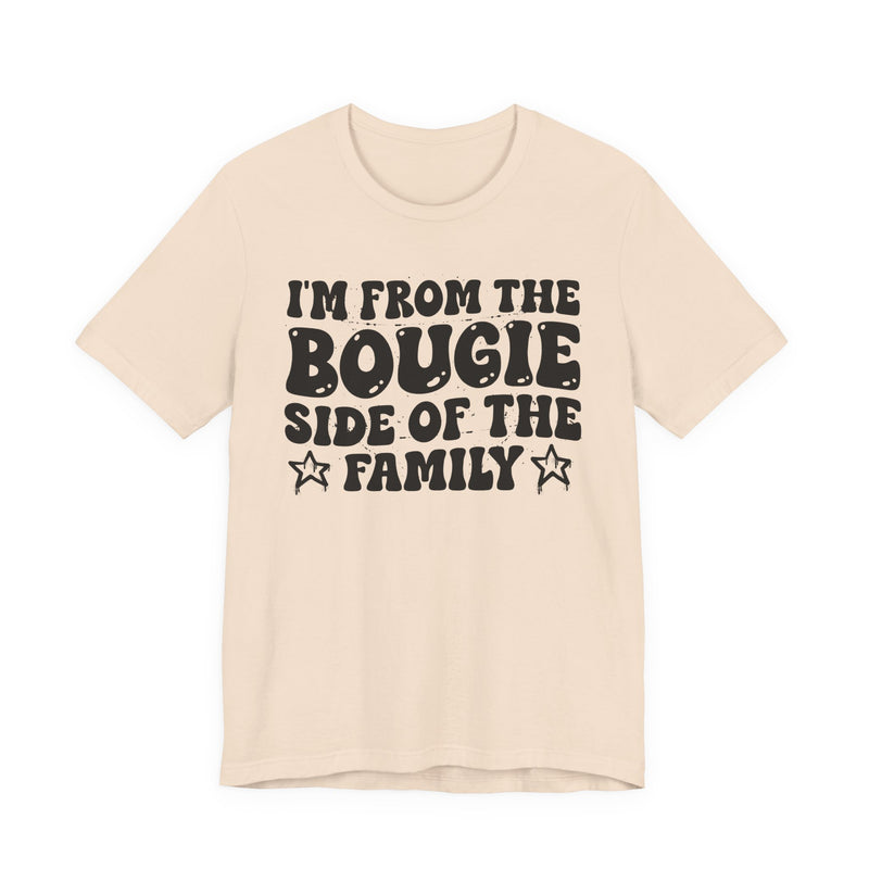 Soft Cream t-shirt with white outlined bubble lettering reading 'I'M FROM THE BOUGIE SIDE OF THE FAMILY', front flat-lay view.