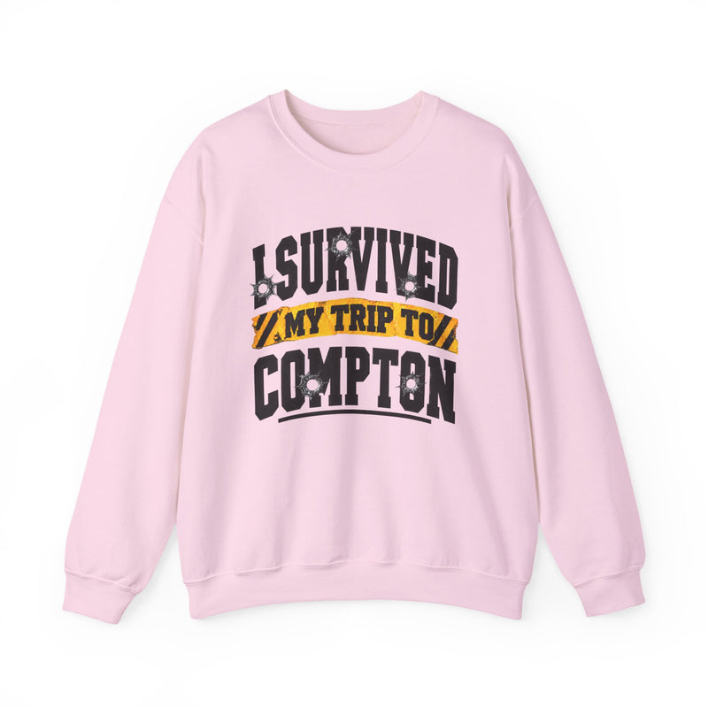 Sweatshirt with collegiate lettering reading I SURVIVED MY TRIP TO COMPTON, front view.