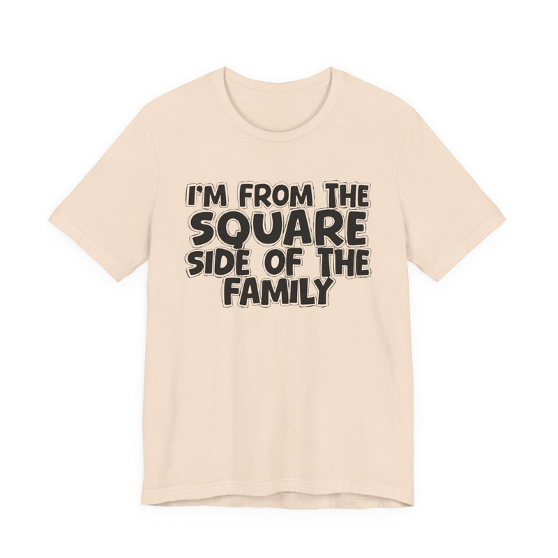 Natural t-shirt with 'I'M FROM THE SQUARE SIDE OF THE FAMILY' in black hand-drawn bubble lettering on the chest, front flat-lay mockup view.