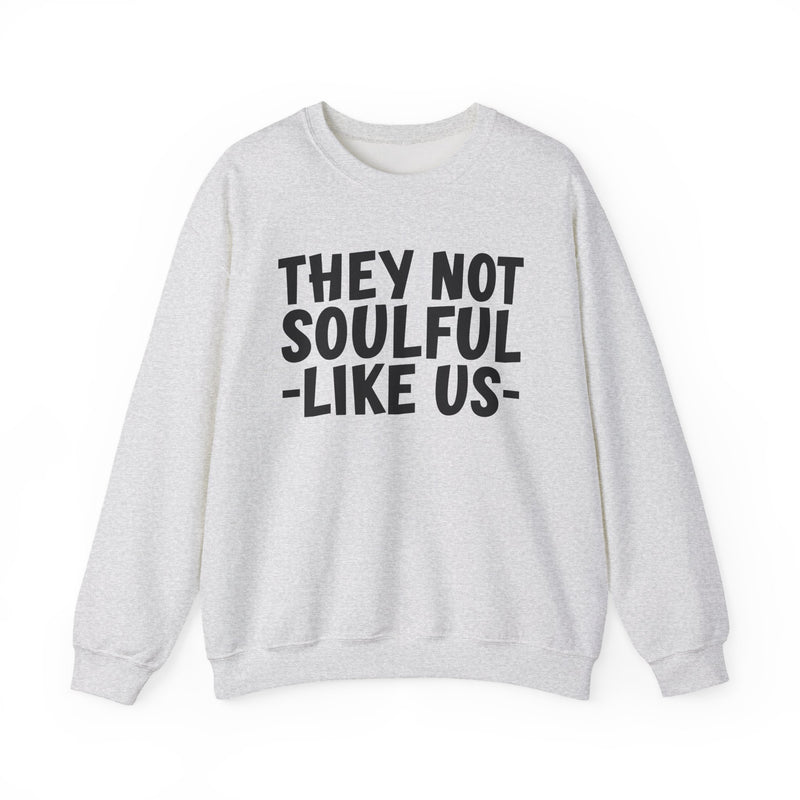 Ash sweatshirt with charcoal bold block lettering reading THEY NOT SOULFUL LIKE US, front flat-lay view.