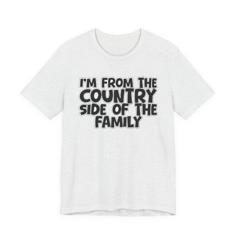 Ash t-shirt with white outlined bubble lettering reading 'I'M FROM THE COUNTRY SIDE OF THE FAMILY', front flat-lay view.