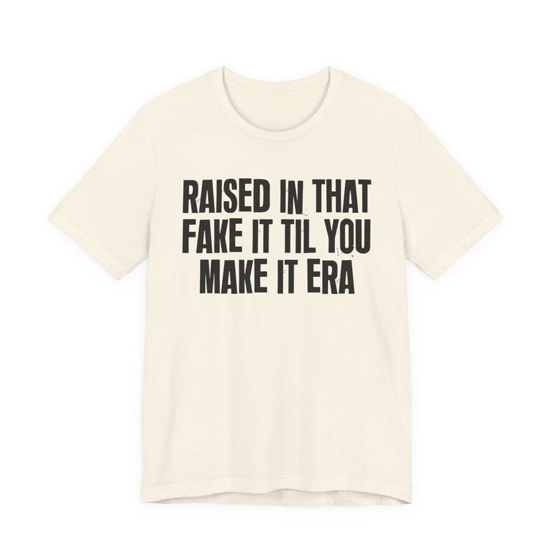 T-Shirt product with lettering reading "RAISED IN THAT FAKE IT TIL YOU MAKE IT ERA", alternate view.