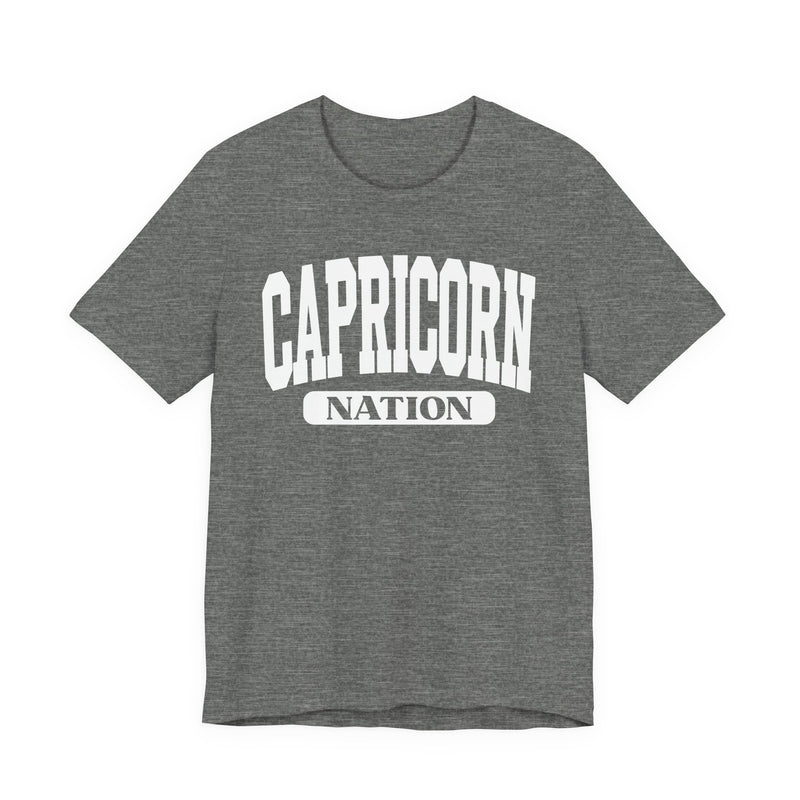 Deep Heather t-shirt with white arched CAPRICORN lettering and a NATION pill badge, front view.
