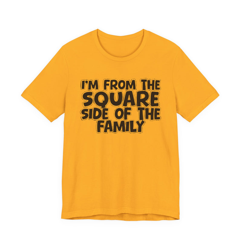 Gold t-shirt with 'I'M FROM THE SQUARE SIDE OF THE FAMILY' in black hand-drawn bubble lettering on the chest, front flat-lay mockup view.