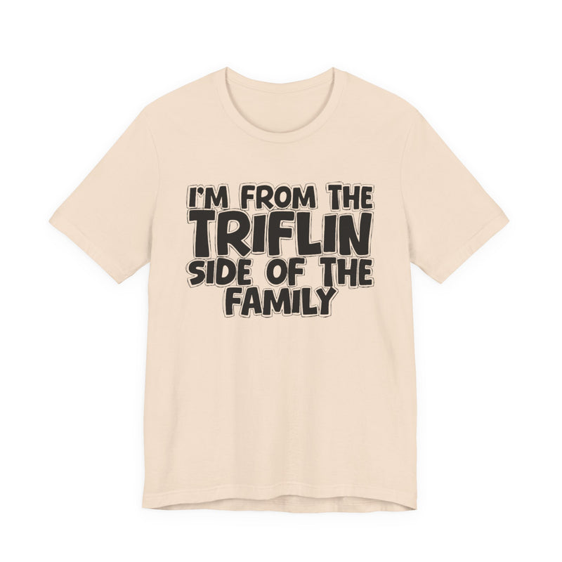Athletic Heather t-shirt with "I'M FROM THE FAKE SIDE OF THE FAMILY" in bold black outlined bubble lettering, front flat-lay view