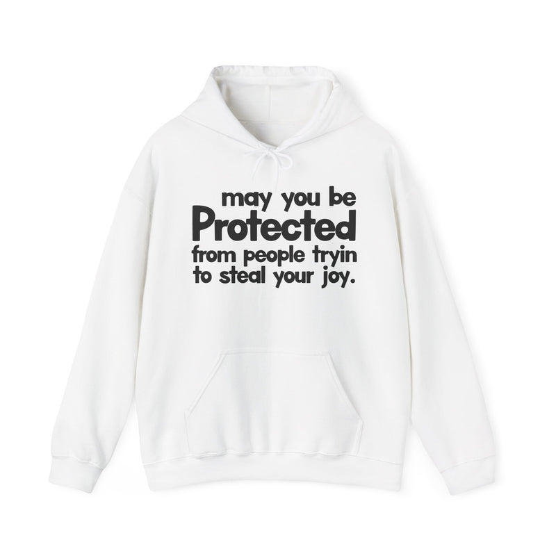 May You Be Protected From People Tryin To Steal Your Joy — Hoodie fabric detail close-up: MAY YOU BE PROTECTED FROM PEOPLE TRYIN TO STEAL YOUR JOY in bold statement lettering. Street Talk Designs protection statement apparel.